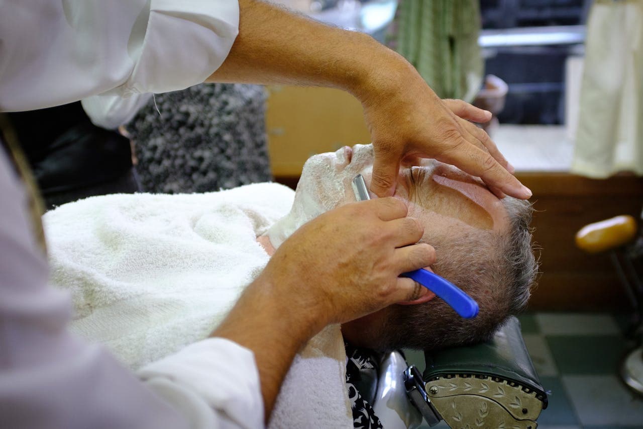 Shaped beard and haircut profile in the chair.