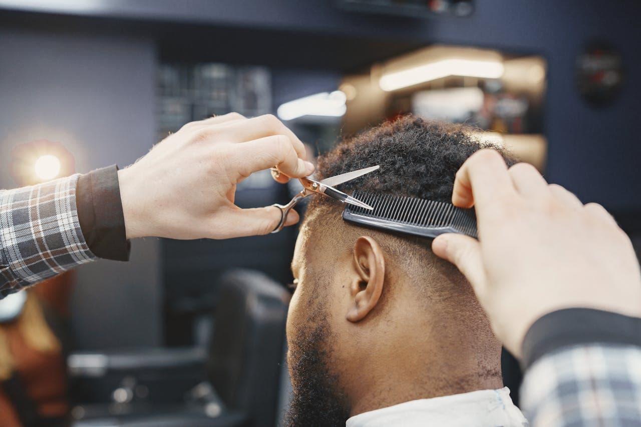 Front-facing beard trim consultation moment.