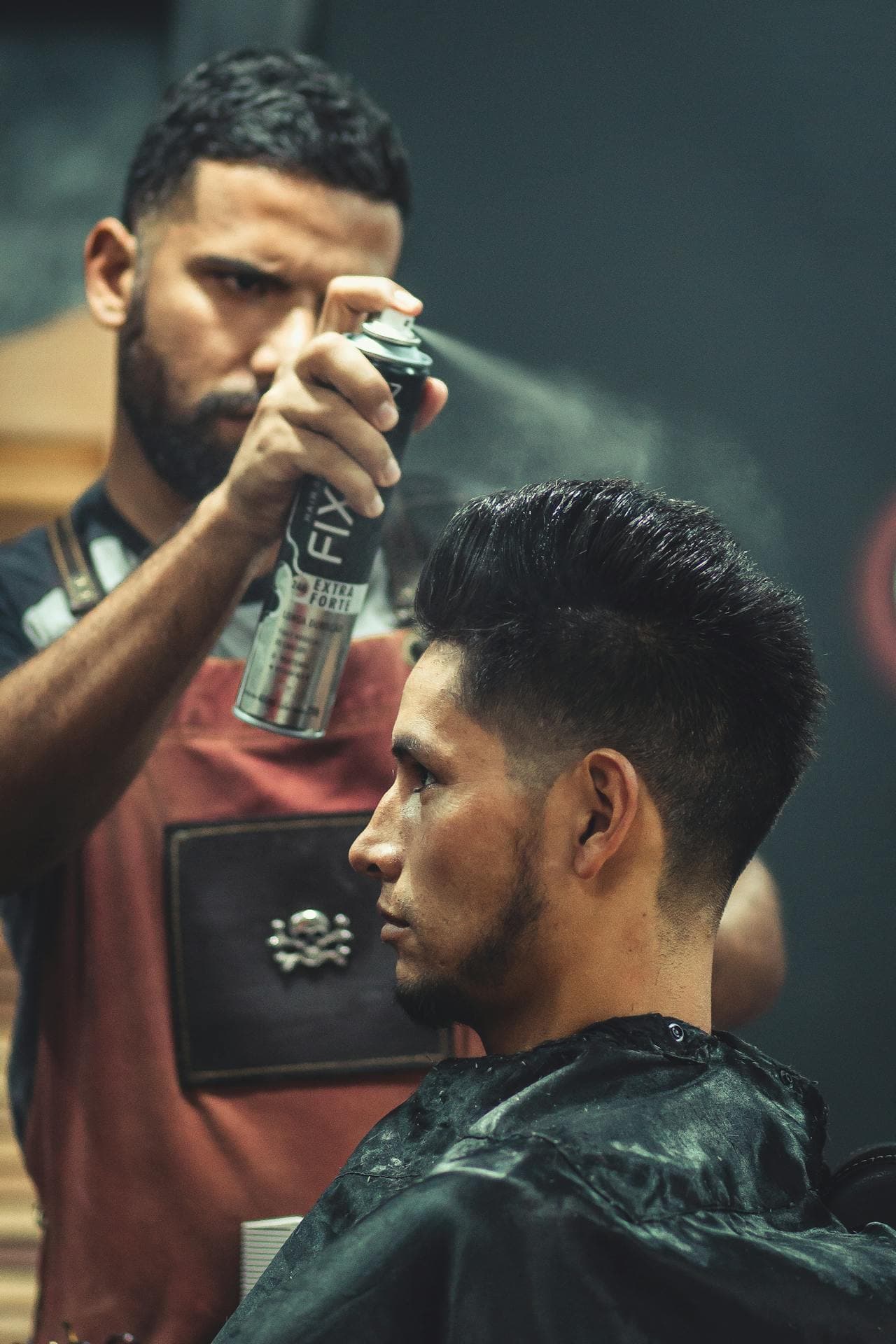 Textured fade finish captured in a premium barbershop setting.