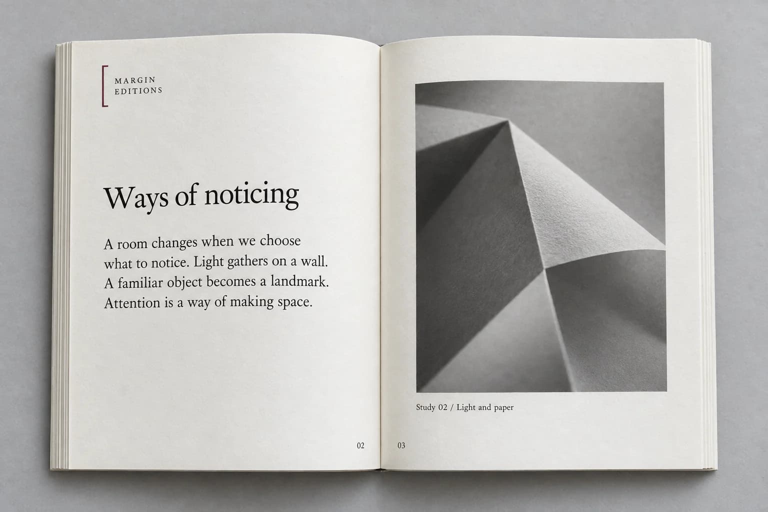 AI-generated open-book mockup with an original short passage on the left and a monochrome study of folded paper on the right.