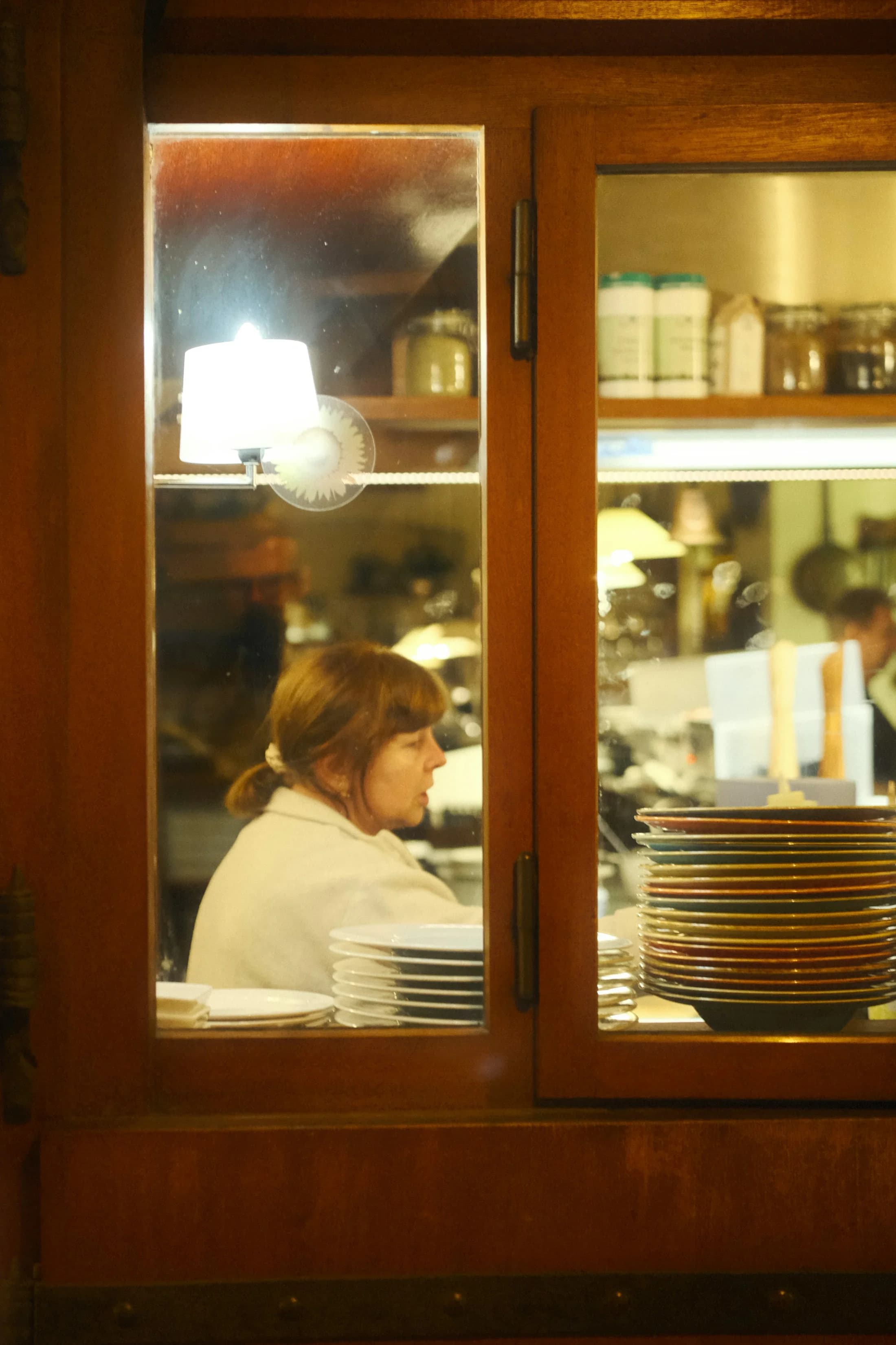 A member of the kitchen team working during service