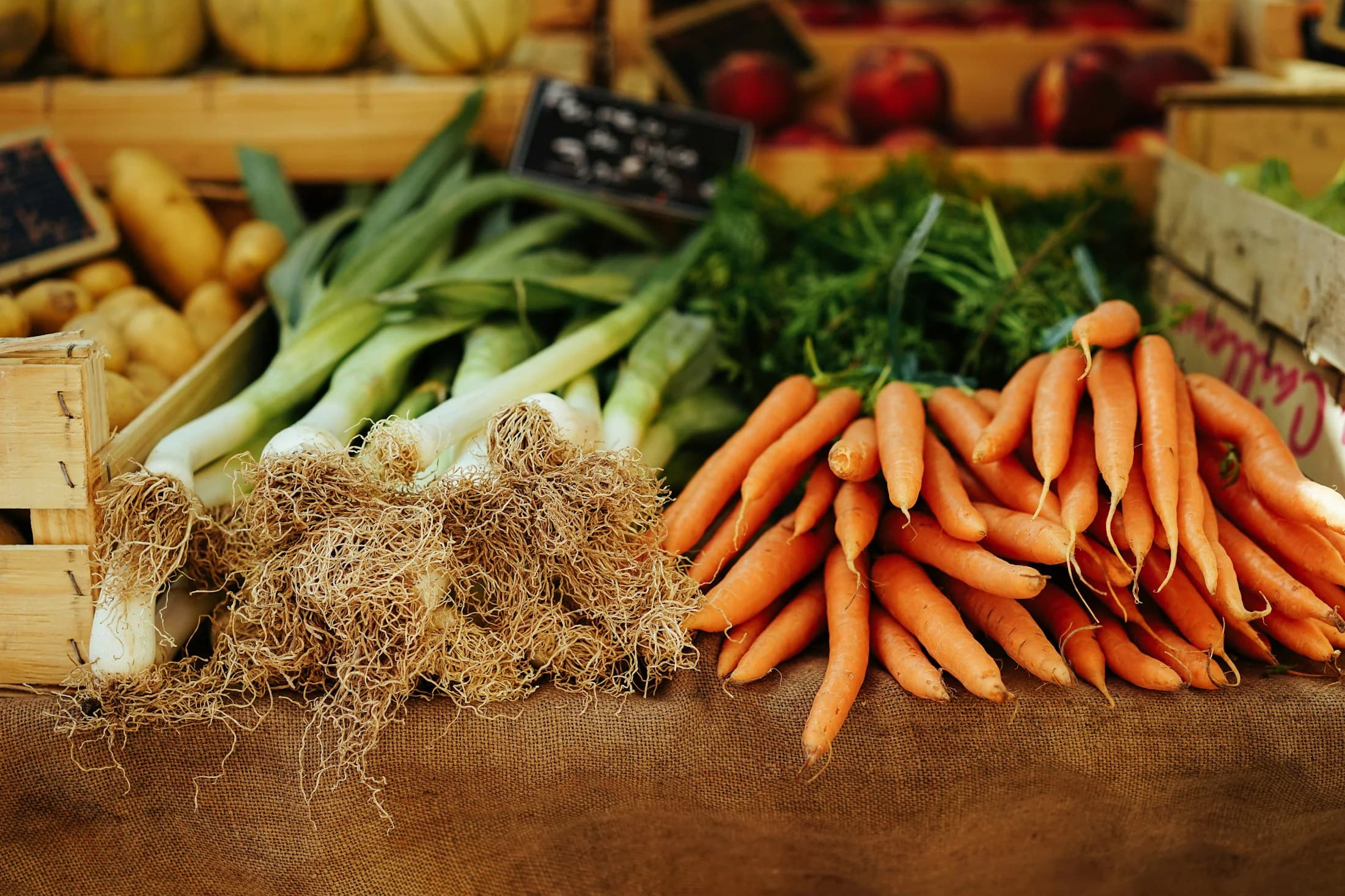 Leeks and carrots at a local produce market