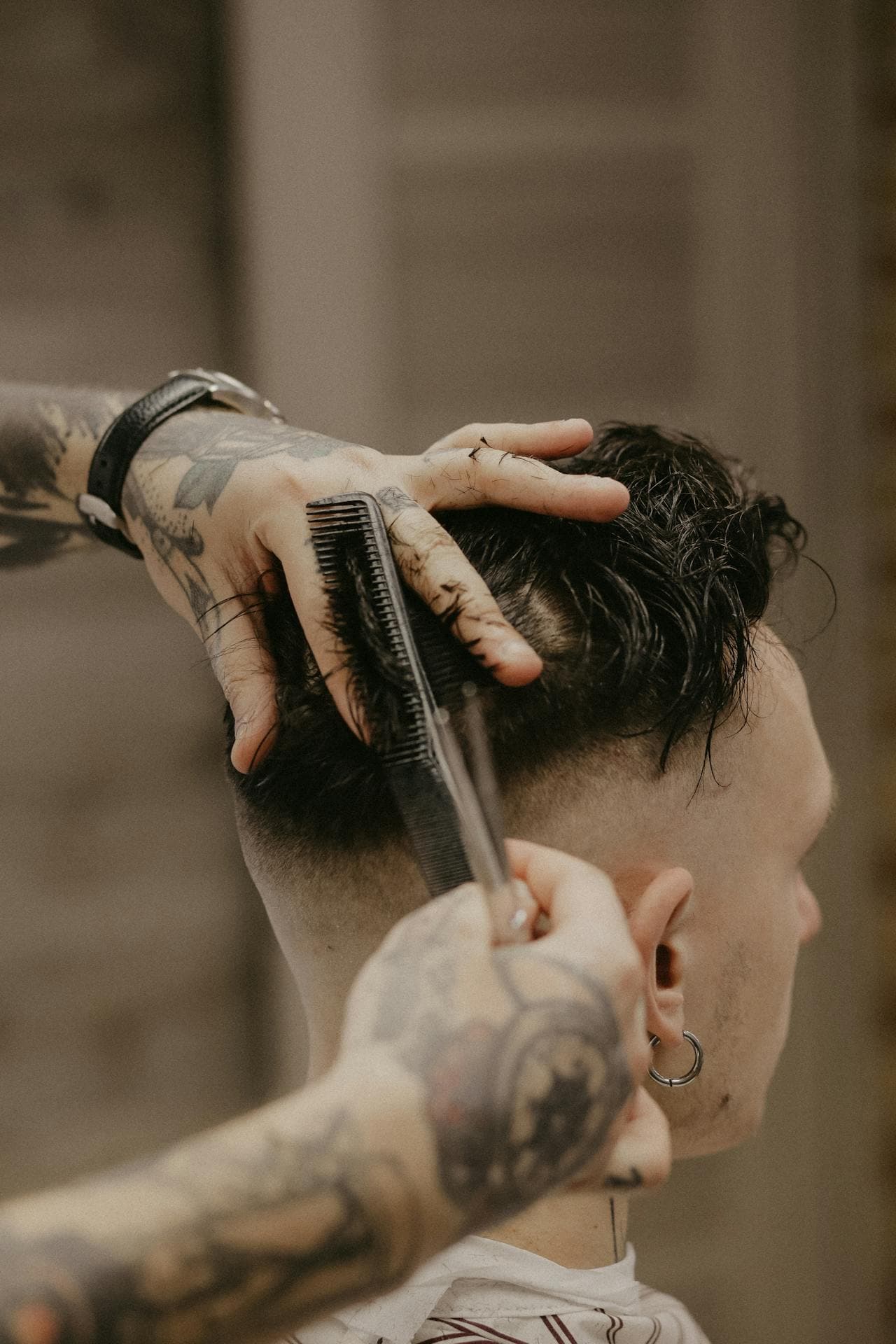 Close scissor work through the top of a haircut.